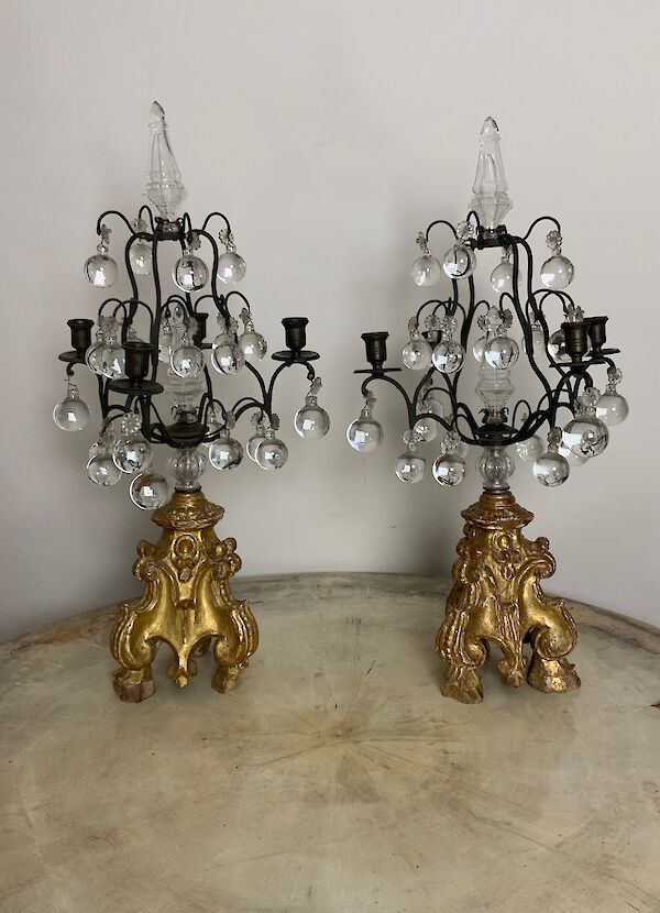 A pair of giltwood candelabra