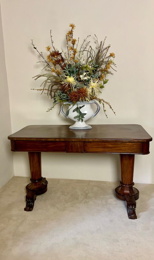 Two drawer mahogany writing table