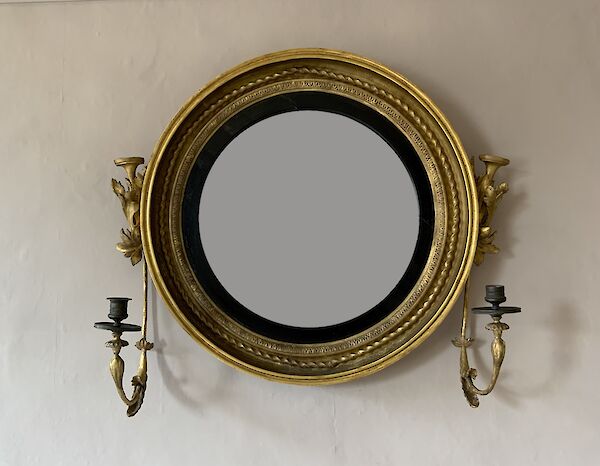 A gilt-wood convex girandole