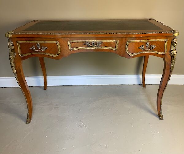 A walnut bureau plat
