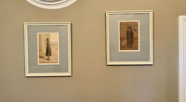A matched pair of watercolours full length portraits of children