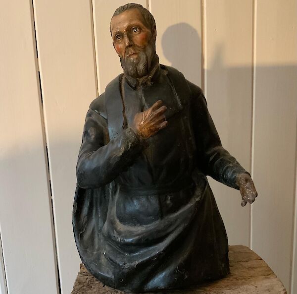 A carved polychrome figure