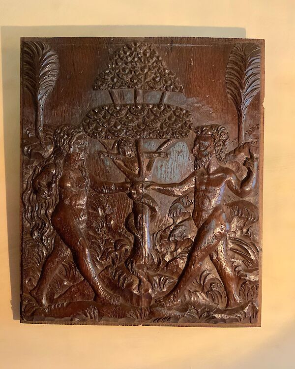 A carved oak panel