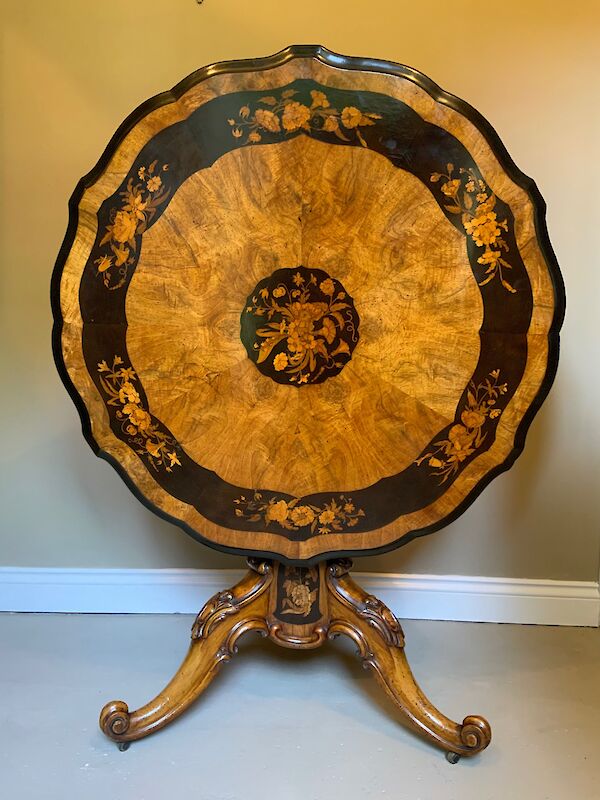 A fine marquetry centre table in the manner of Edward Holmes Baldock